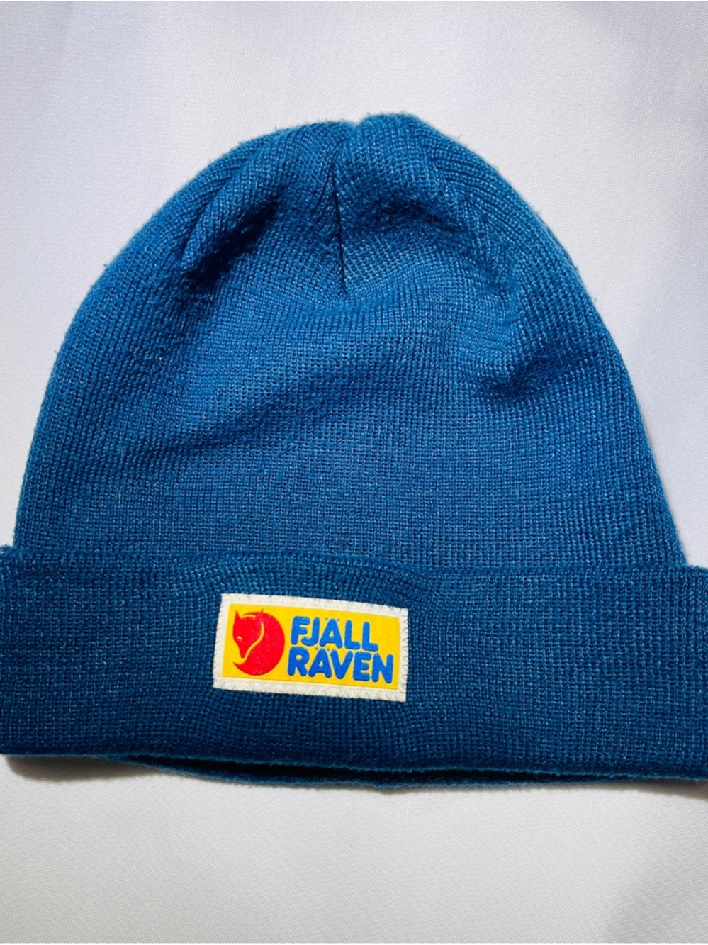 Fjallraven Blue Beanie with Yellow Logo Patch